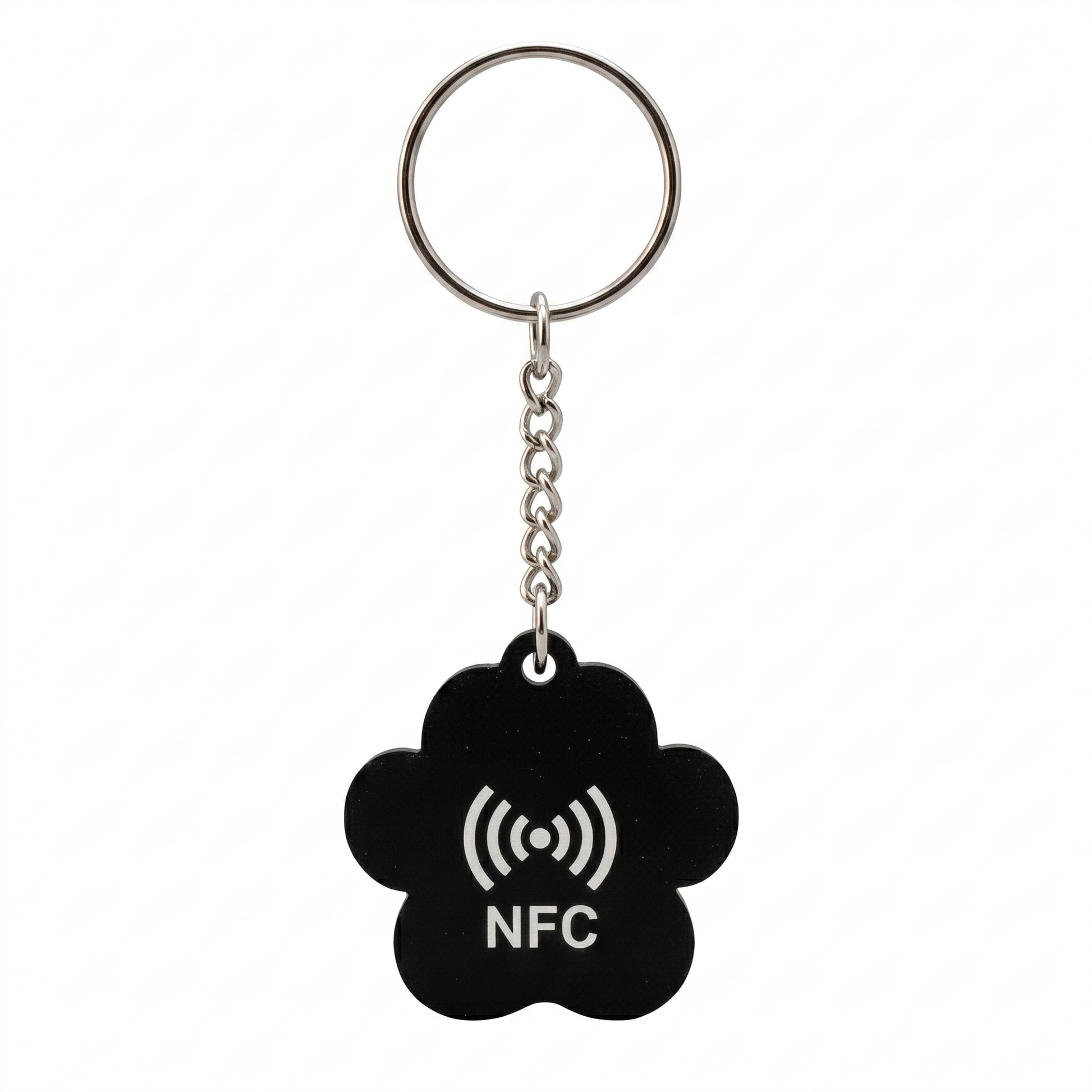 Black NFC keychain with a white symbol on a white background